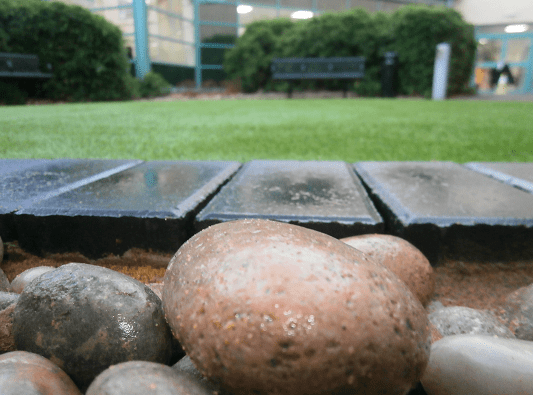 view from the ground at the block paving and gravel