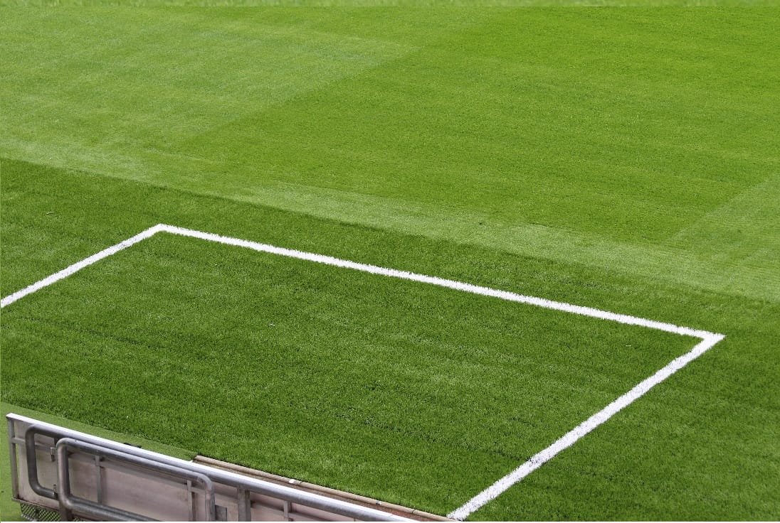 artificial turf touchlines at wigan stadium with white line border