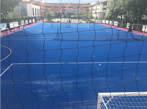 view behind the net of the football muga at the secondary school
