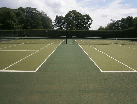 double tennis court surface made from green artificial turf