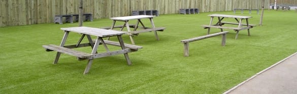 school picnic area with artificial grass surfacing