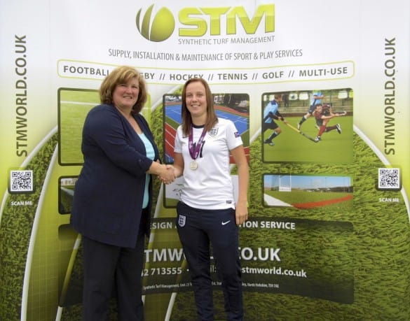 England Football star Beth Mead stood in front of STM sign