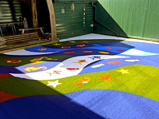 Artificial grass outdoor classroom and outdoor learning area for primary school