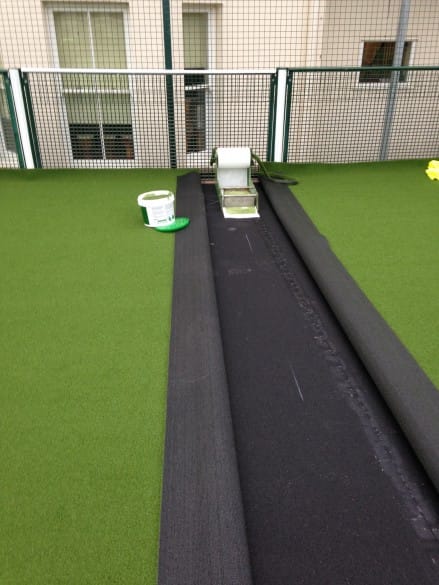 installing artificial turf netball court joining two pieces of artificial turf together