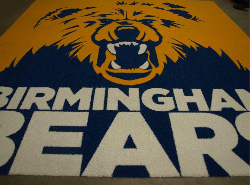 Birmingham Bears logo transformed into astroturf mat