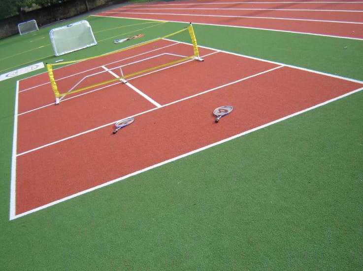 mini tennis court in playground