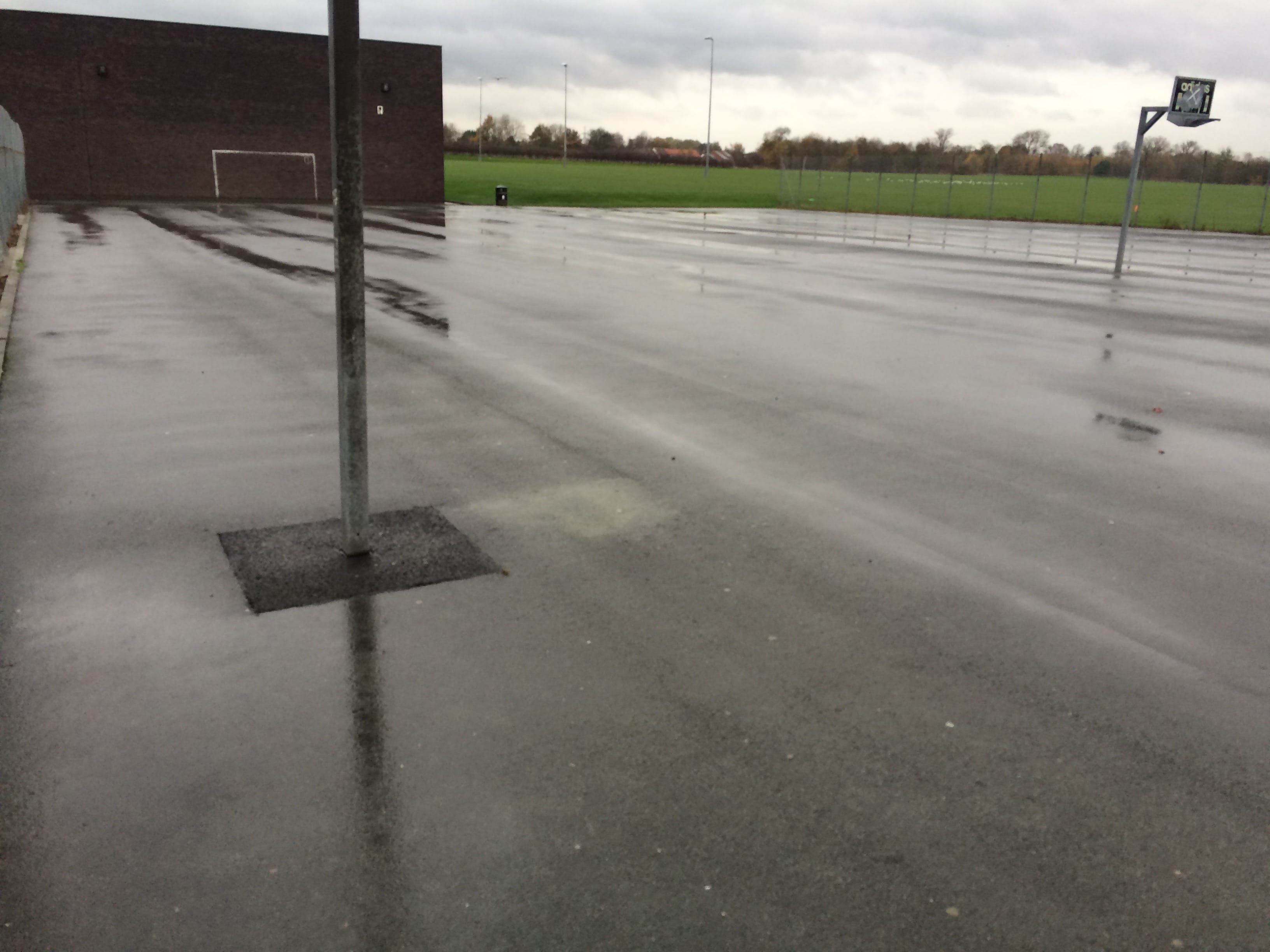 concrete sports surface in the rain