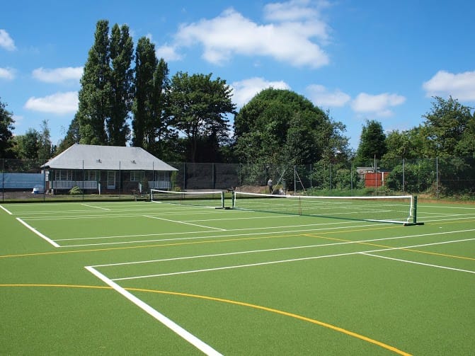 Synthetic turf muga used as a tennis court