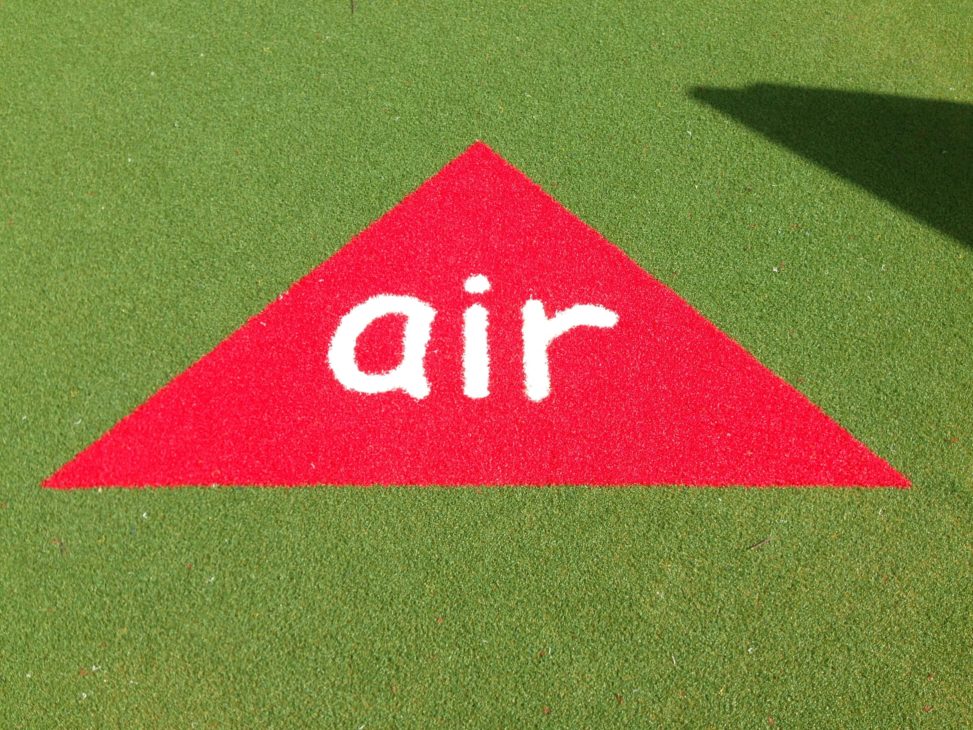 red triangle phonics tile spelling 'air'