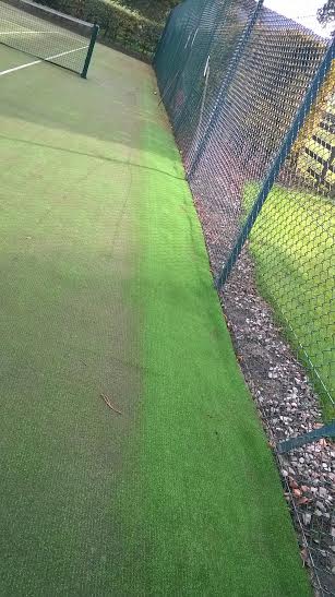 part maintaines tennis court showing clear difference