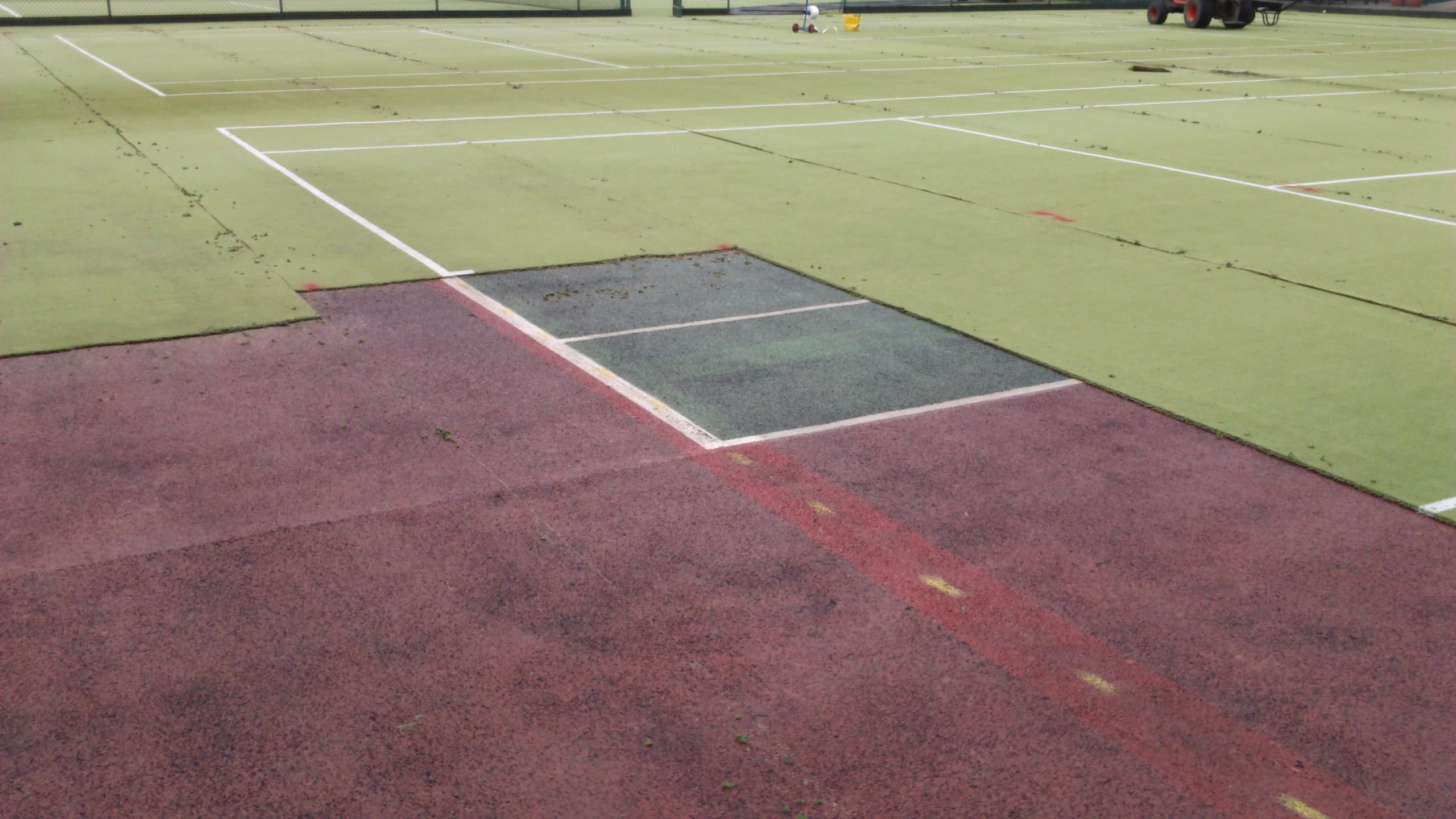 section of the tennis court is removed