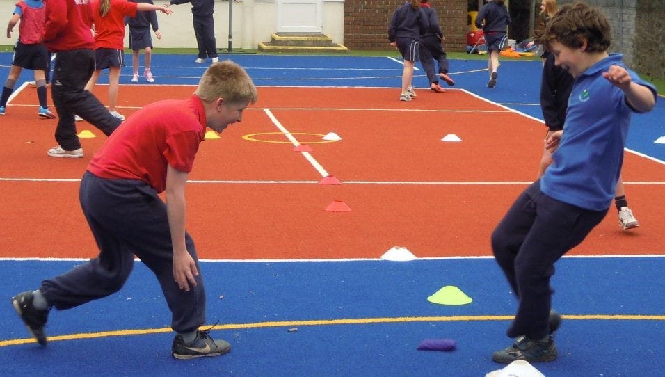 pupils in PE on school muga