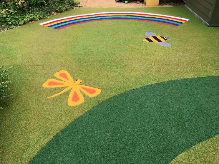 rainbow, butterfly and bee artificial turf playground design