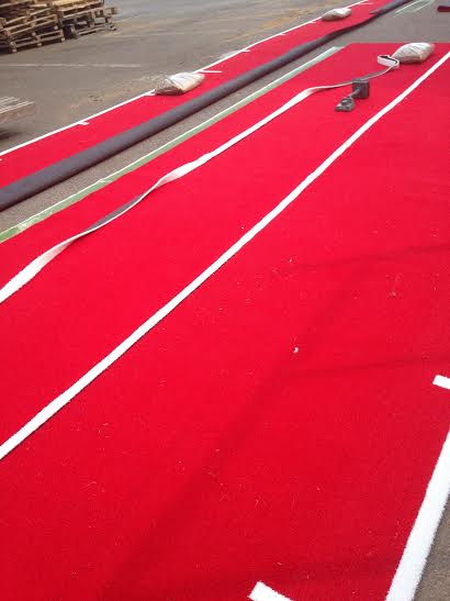 gluing the lines of the red gym track together
