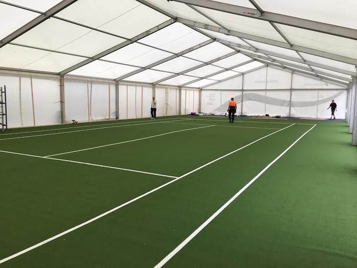 tennis court installation complete with artificial grass