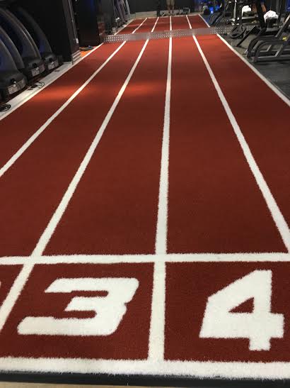 finished installation of rust and white gym track
