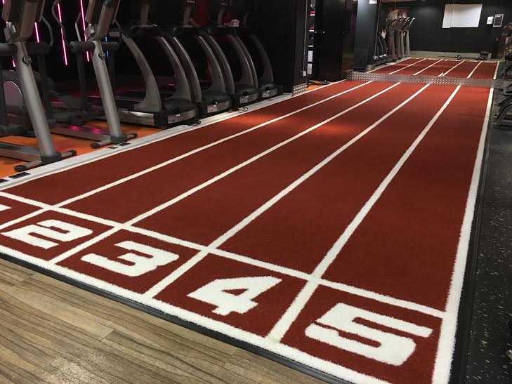 gym track installed at the Gym Way over existing gym flooring
