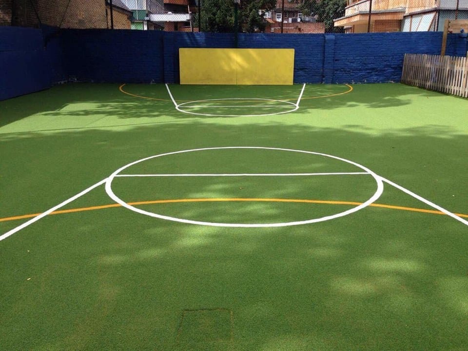 the white and yellow synthetic markings on muga