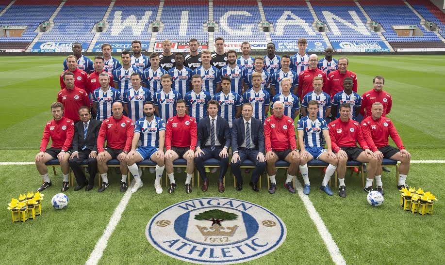 wigan athletic team photo with artificial turf logo mat front centre