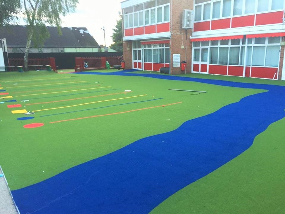 blue and green synthetic grass playground