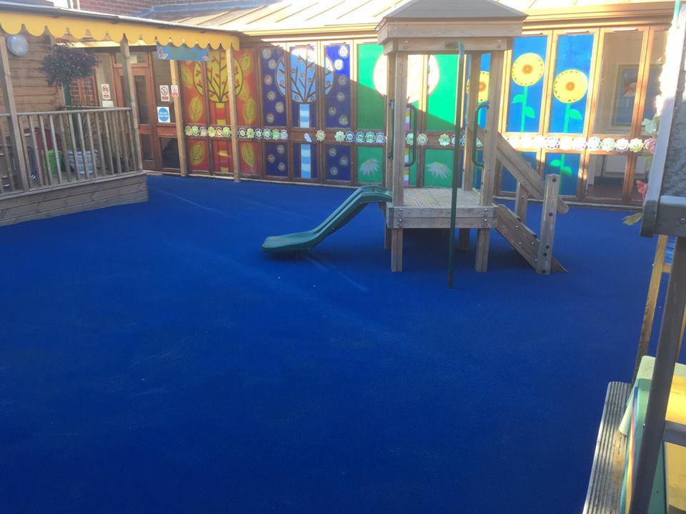 blue artificial turf surface for schools