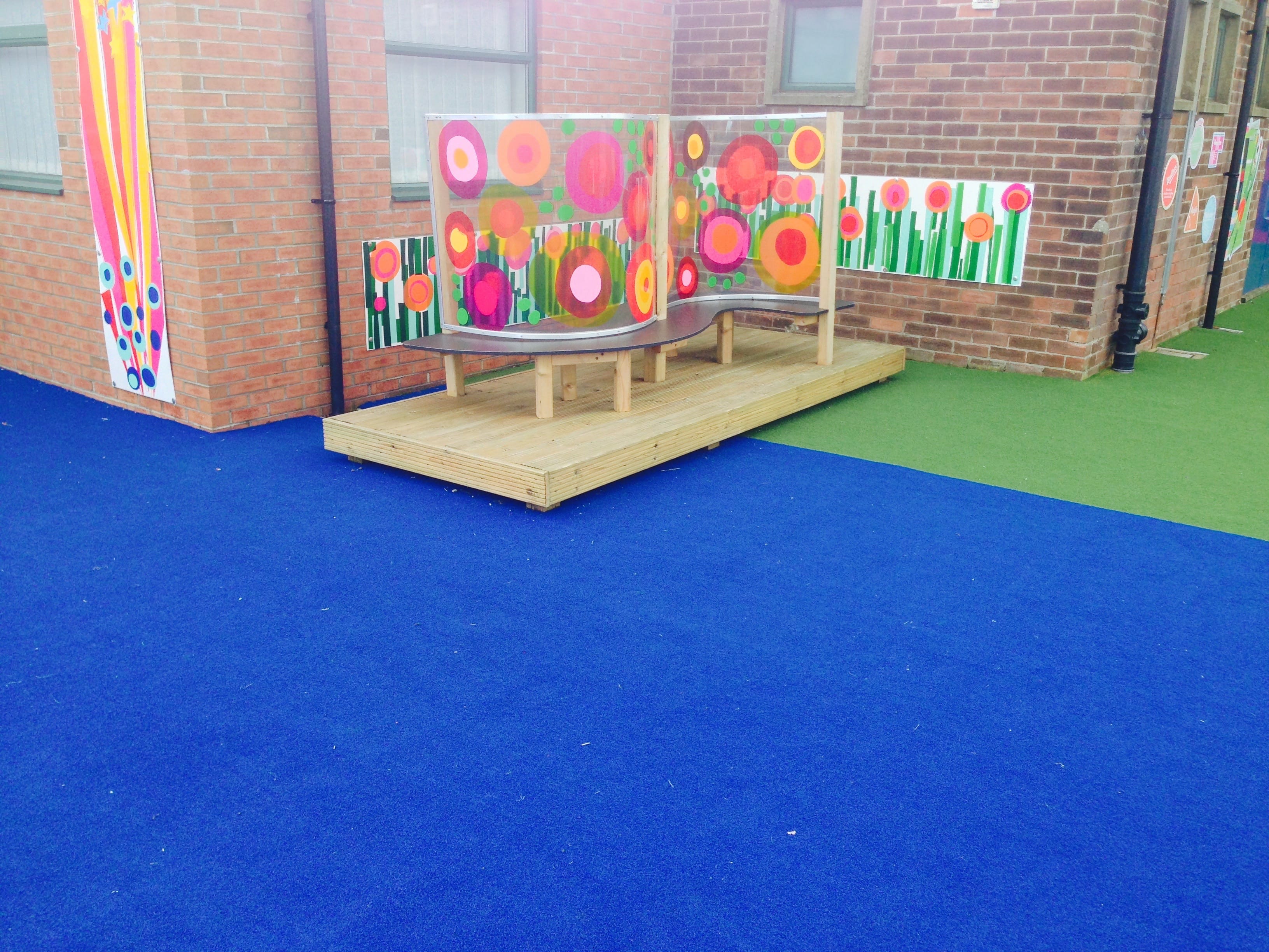 blue and green artificial grass playground surfacing