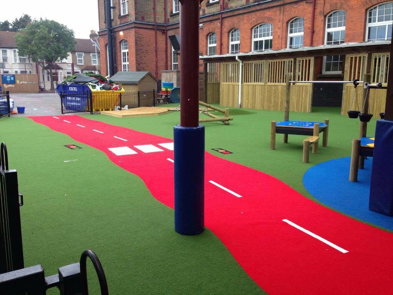 red artificial turf road markings in school playground