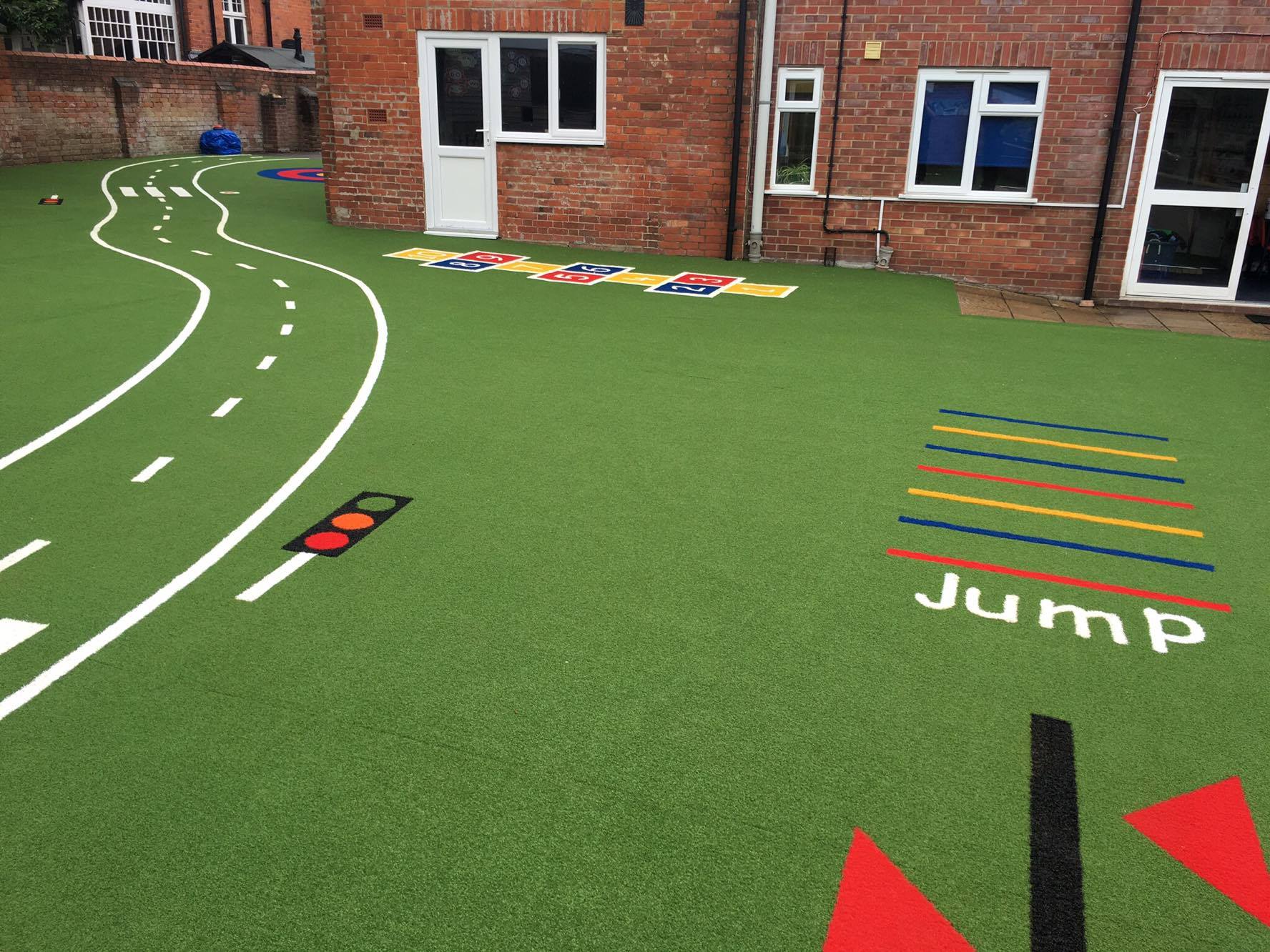 epic artificial turf playground showing roadway and jump line