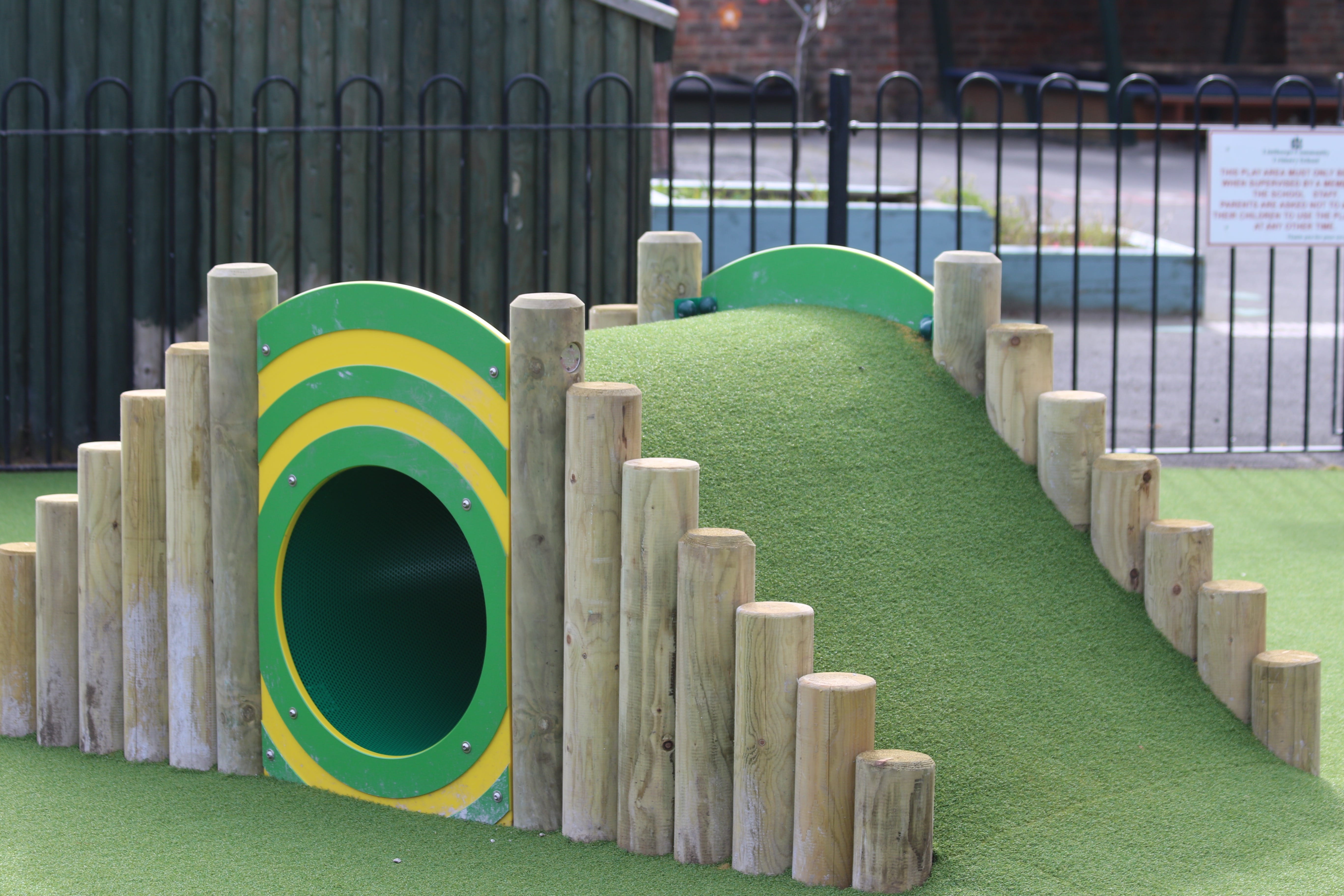 green landscaping teletubbies tunnel made with artificial grass