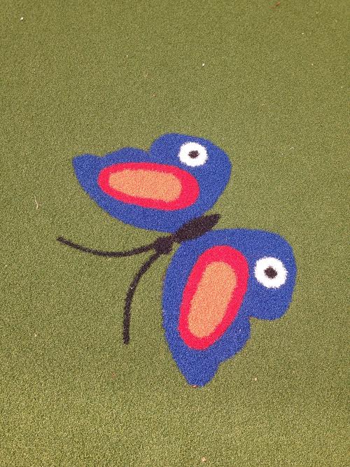 blue butterfly design on synthetic turf