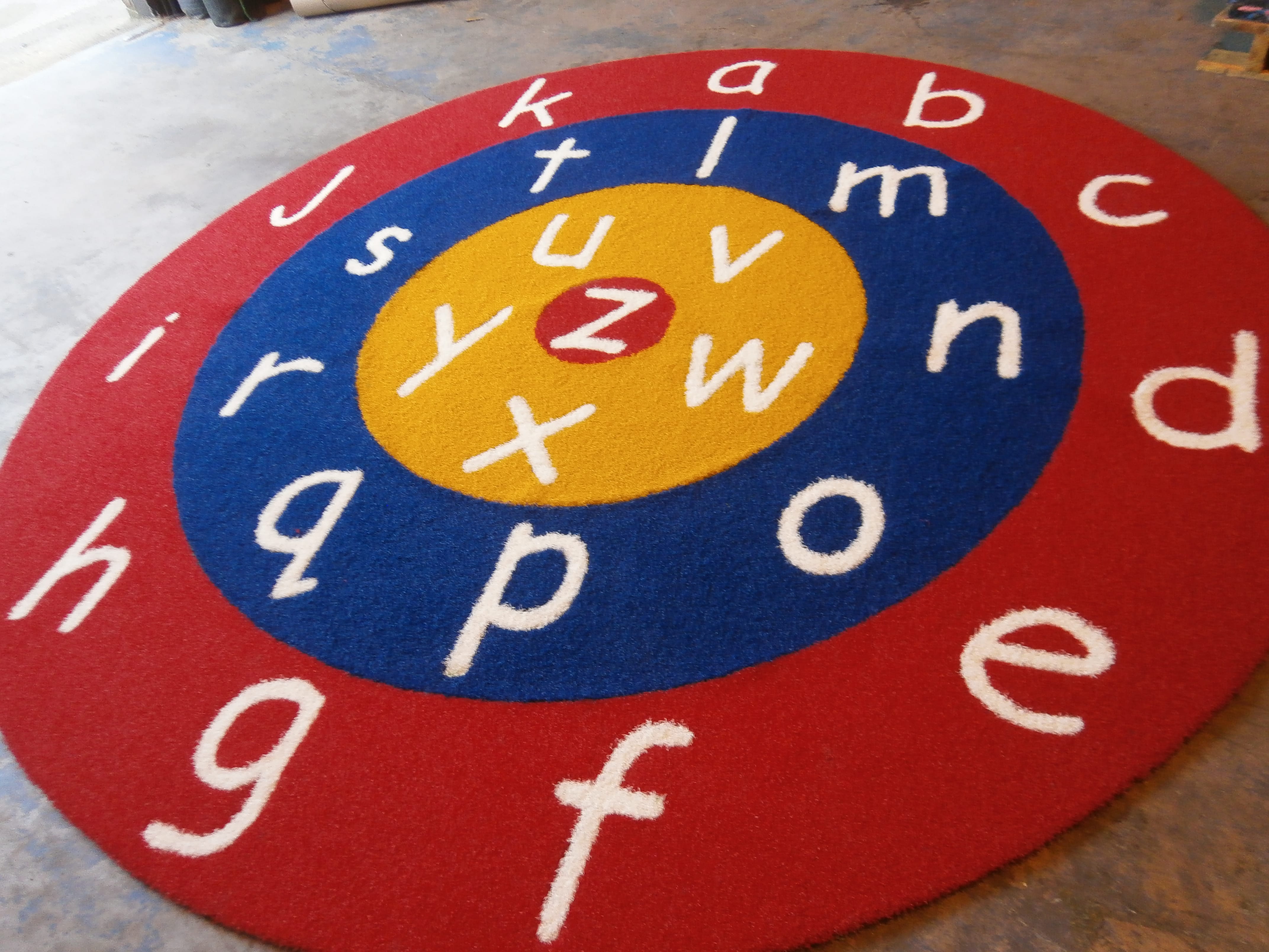 alphabet target in red, blue and yellow