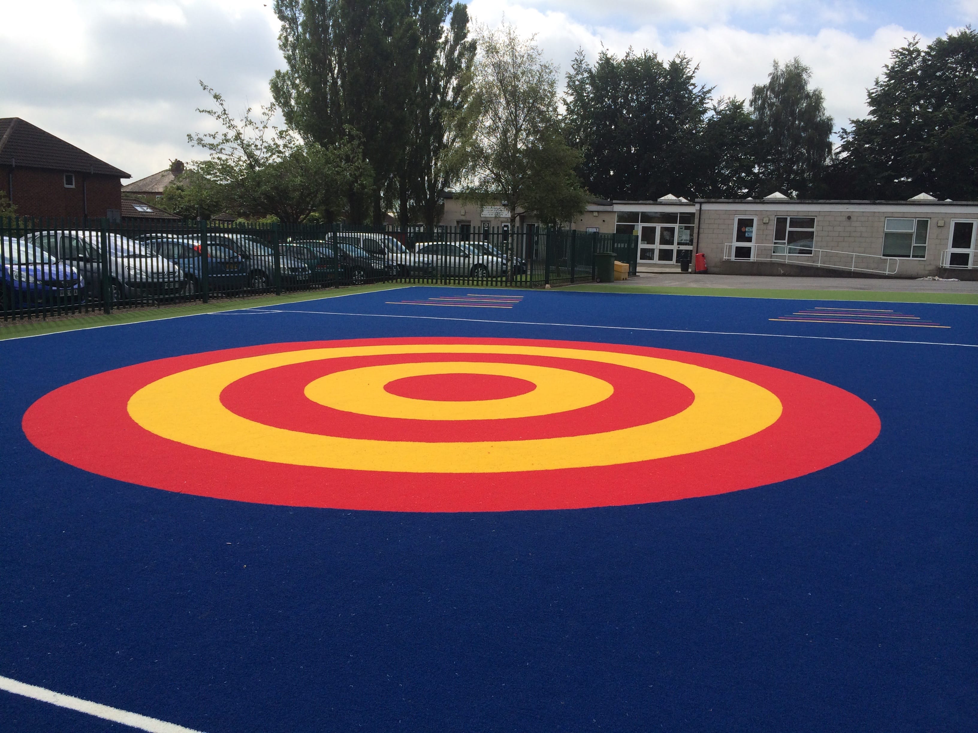 yellow and red target in blue synthetic surface