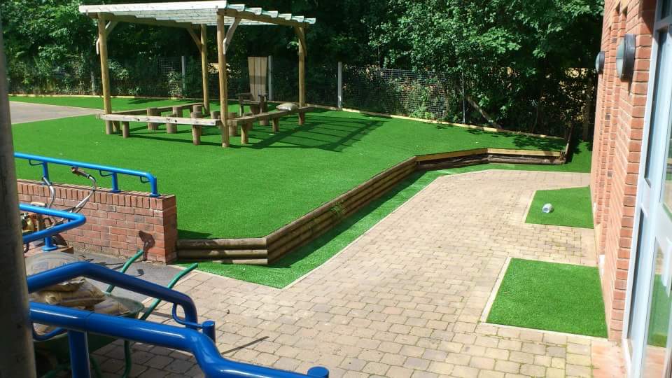 school seating area designed with artificial turf