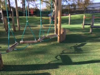 trim trail with artificial turf playground grass underneath