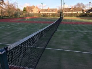 view along the net of the new tennis courts